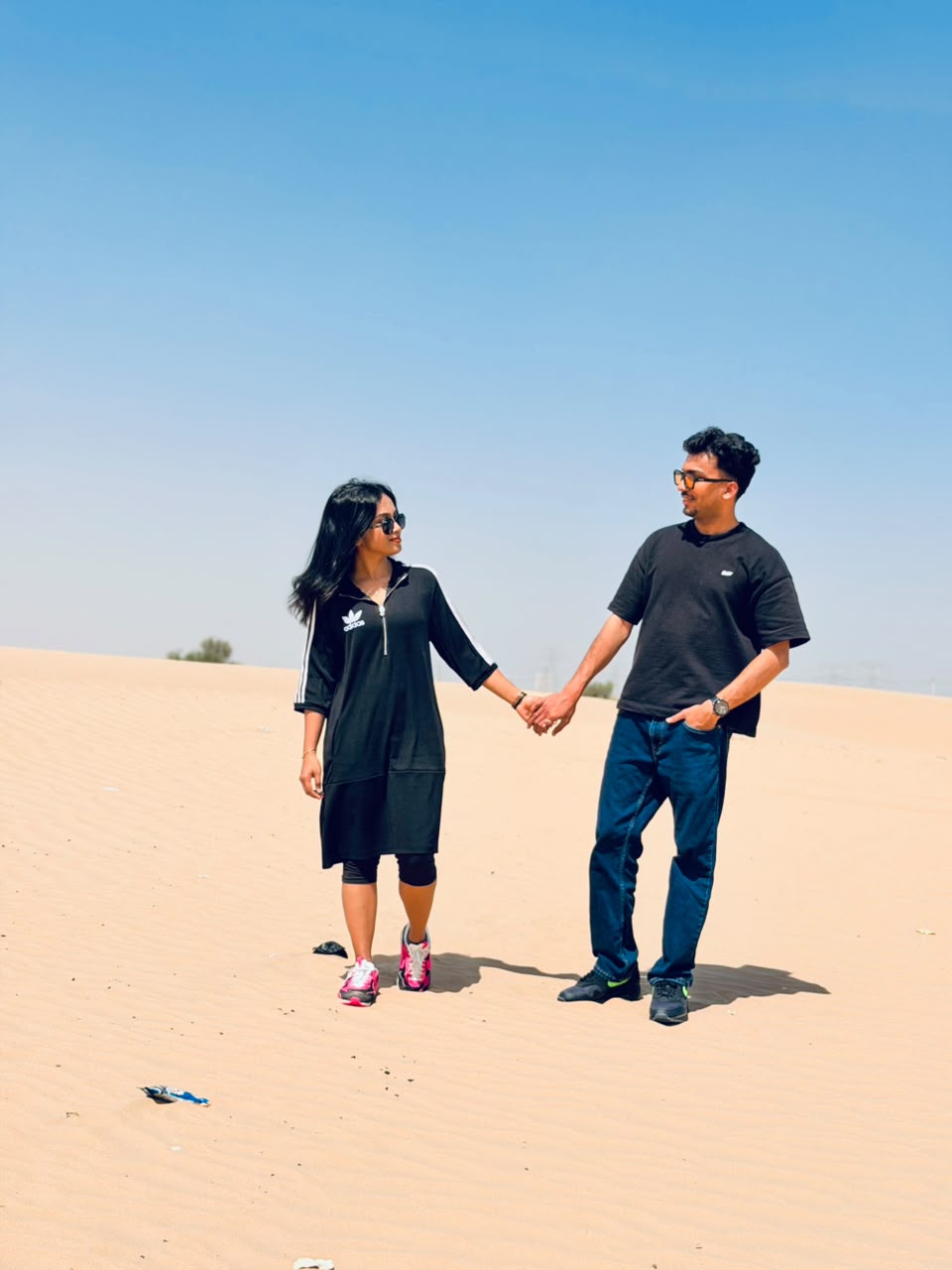 Abhirami and Ashwin holding hands